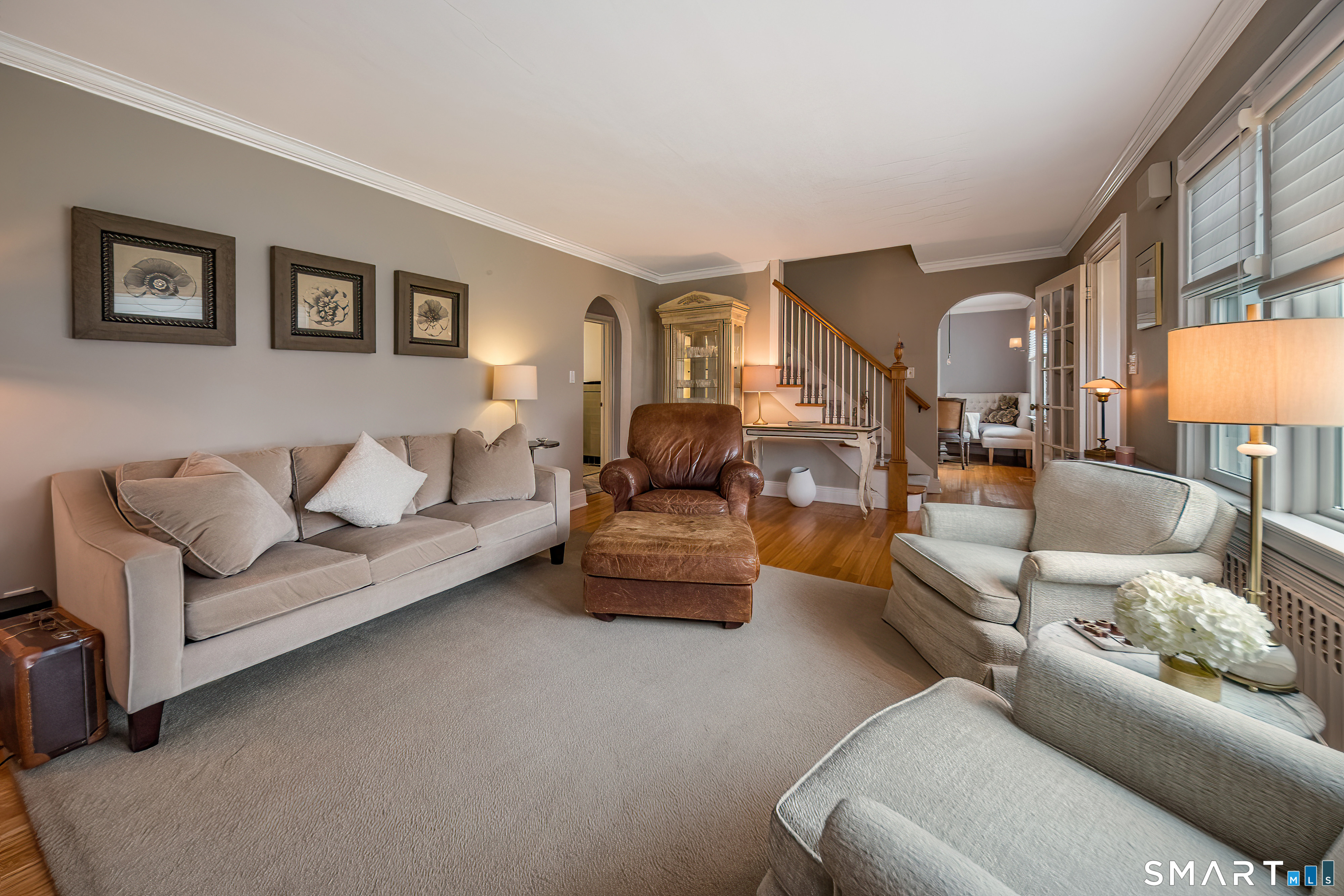 59 Forest Hill Road North Haven, CT 06473 - Photo 19 of 35 a living room with furniture and a lamp