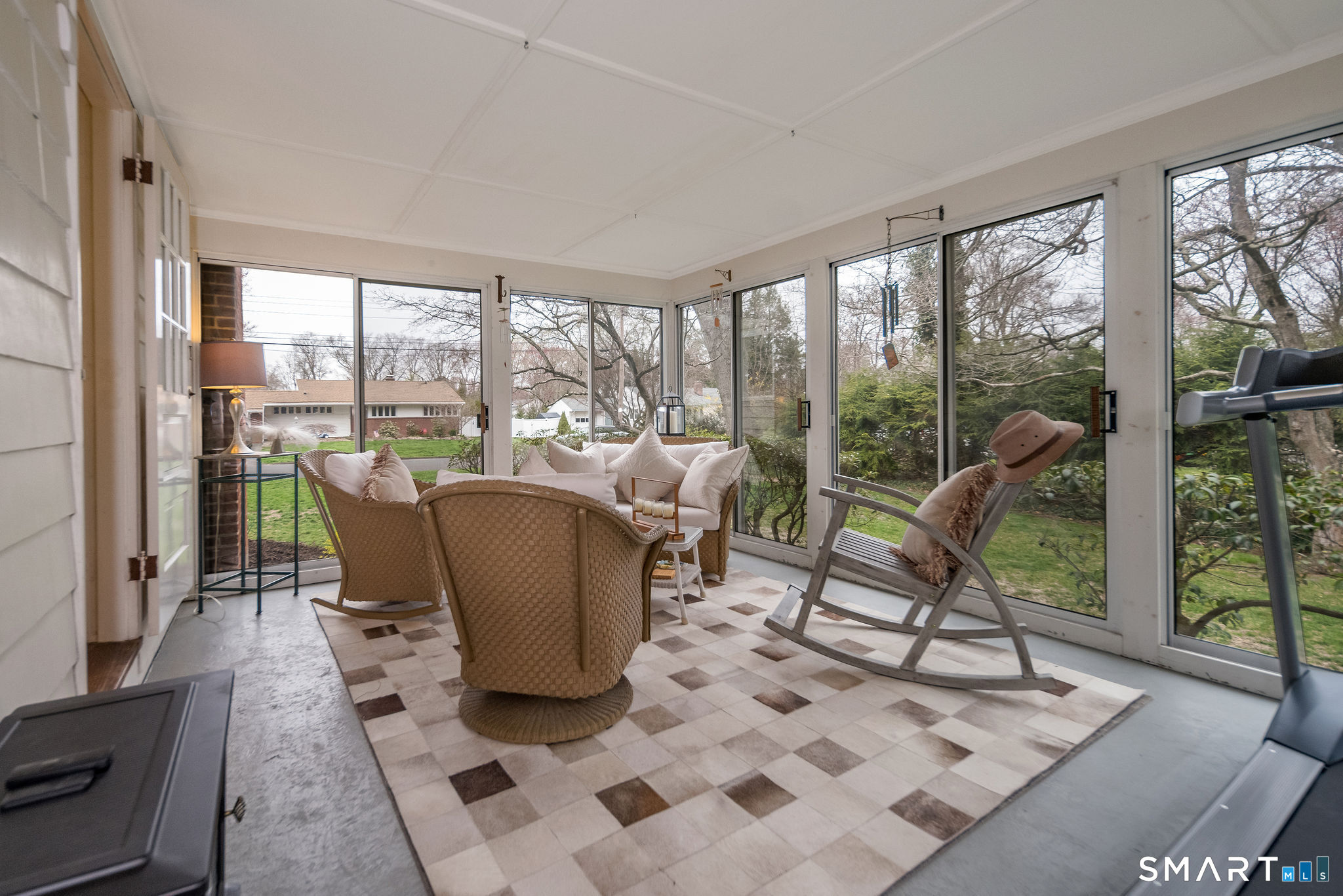 59 Forest Hill Road North Haven, CT 06473 - Photo 24 of 35 a living room with furniture and a floor to ceiling window