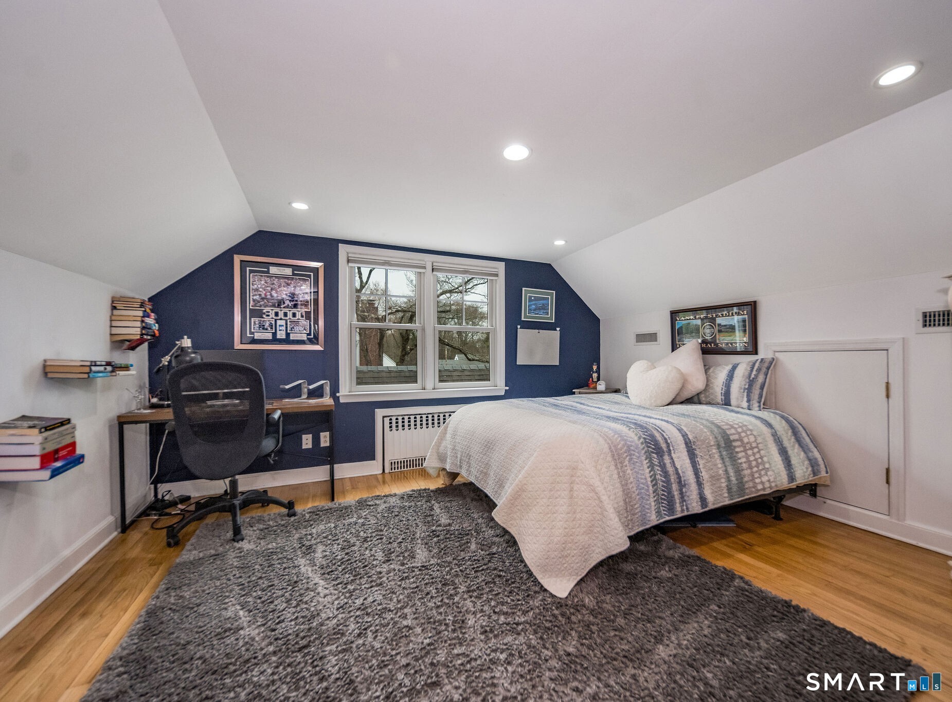 59 Forest Hill Road North Haven, CT 06473 - Photo 26 of 35 a spacious bedroom with a bed and glass table
