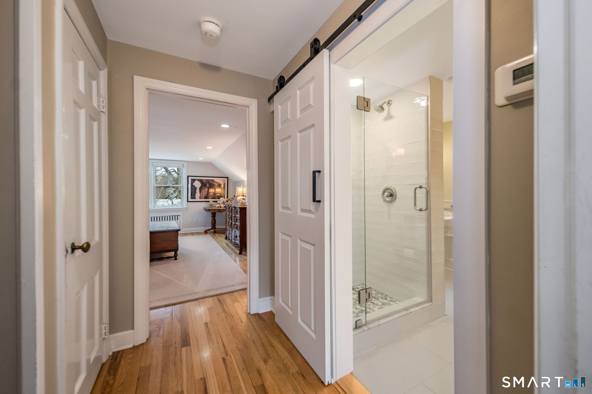 59 Forest Hill Road North Haven, CT 06473 - Photo 27 of 35 a view of a bathroom with a glass door and shower