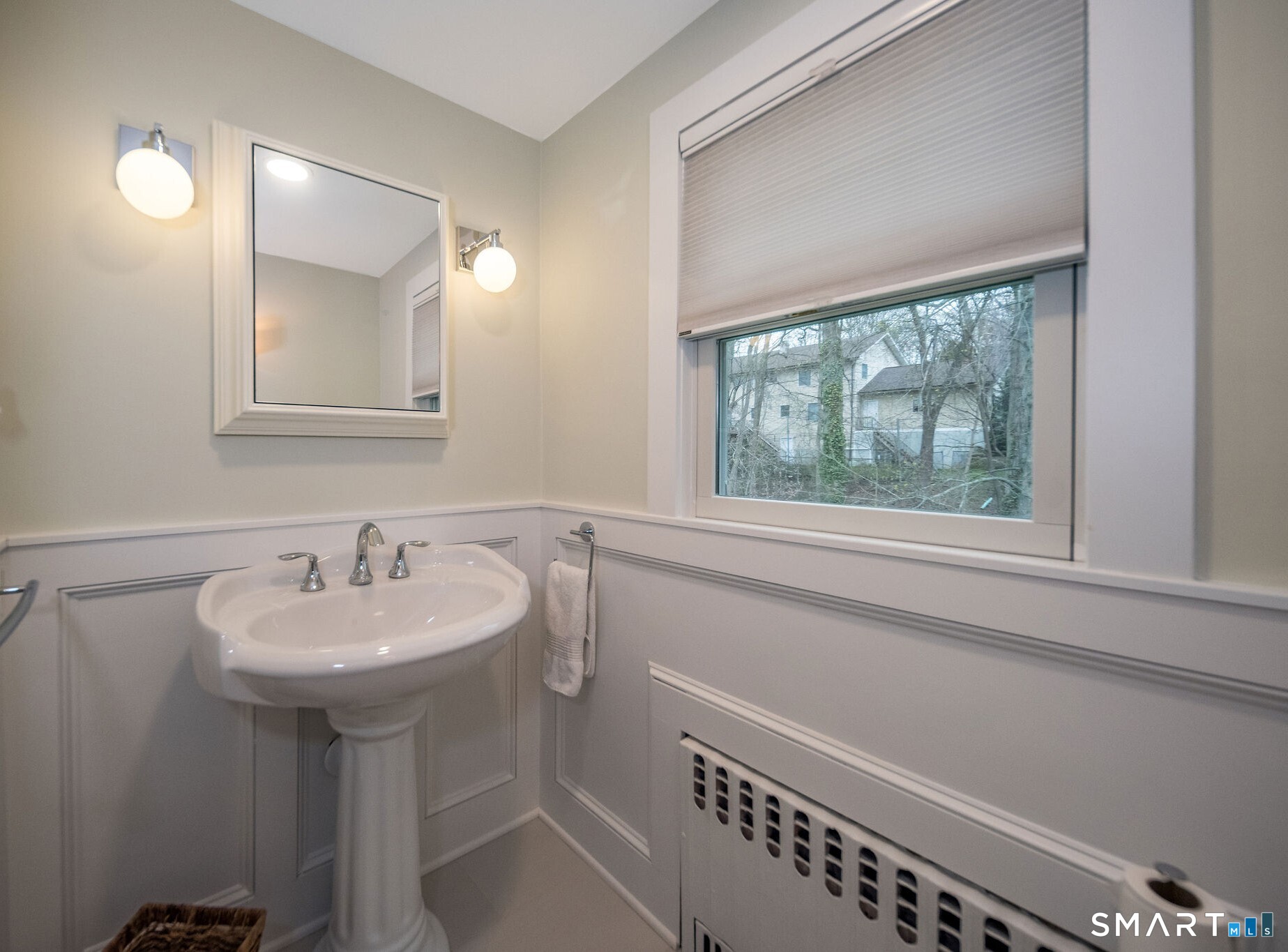 59 Forest Hill Road North Haven, CT 06473 - Photo 29 of 35 a bathroom with a sink and a mirror