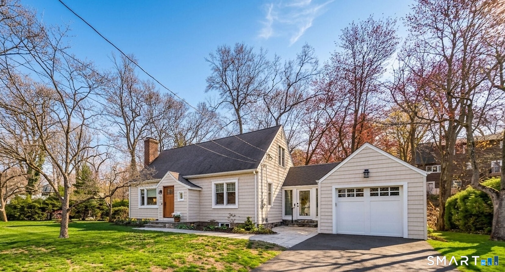 59 Forest Hill Road North Haven, CT 06473 - Photo 3 of 35 a front view of a house with a yard
