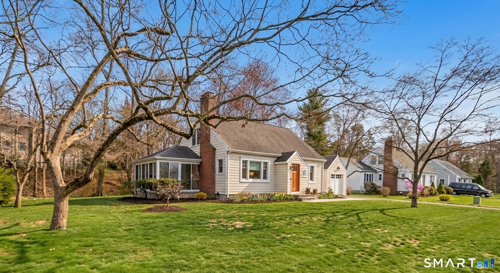 59 Forest Hill Road North Haven, CT 06473 - Photo 34 of 35 a front view of a house with a garden
