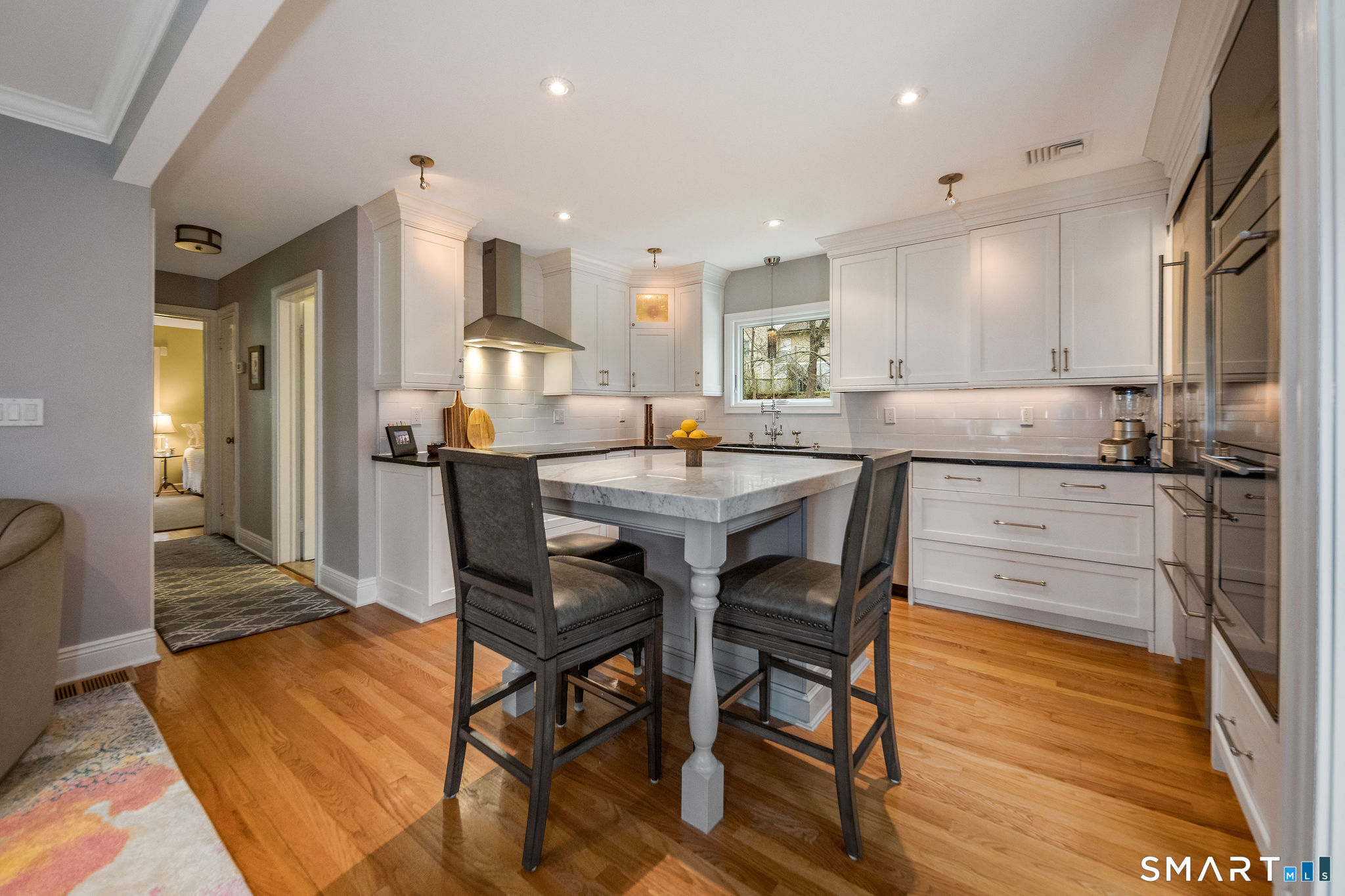 59 Forest Hill Road North Haven, CT 06473 - Photo 5 of 35 a dining hall with stainless steel appliances granite countertop a dining table and chairs