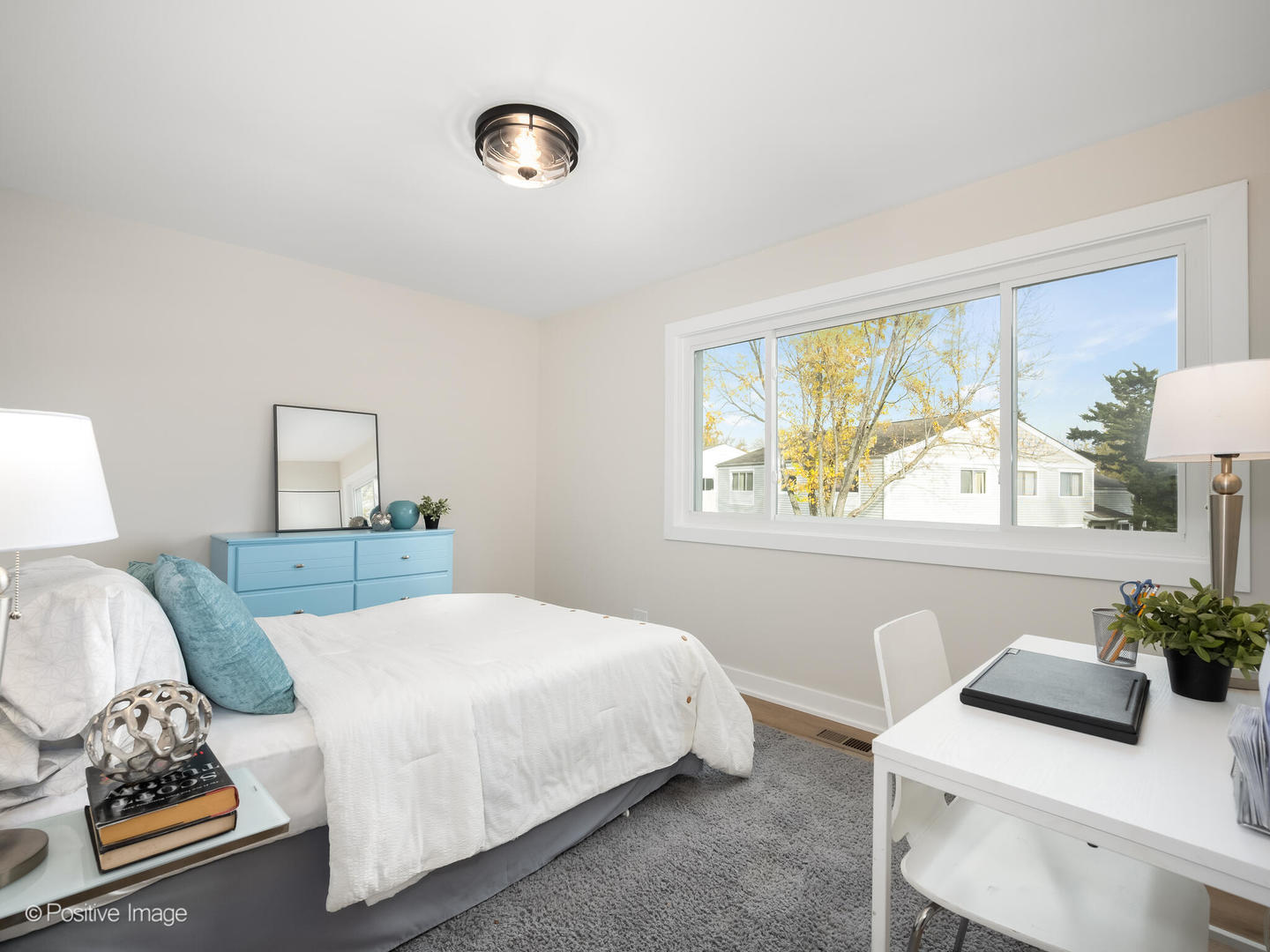 823 Cambridge Place, Unit 823 Wheeling, IL 60090 - Photo 12 of 16 a bedroom with a bed and a window