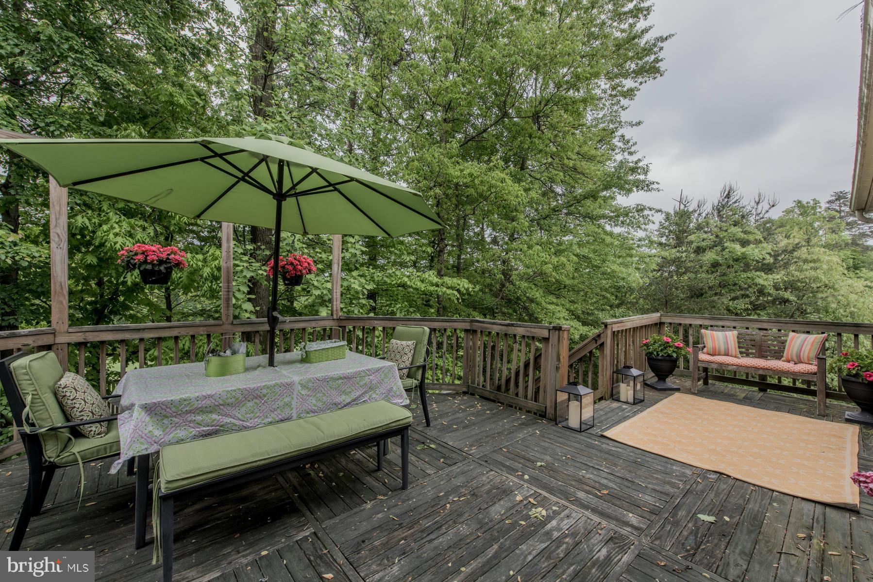 6013 Sandy Ridge Elkridge, MD 21075 - Photo 17 of 30 a view of a terrace with furniture