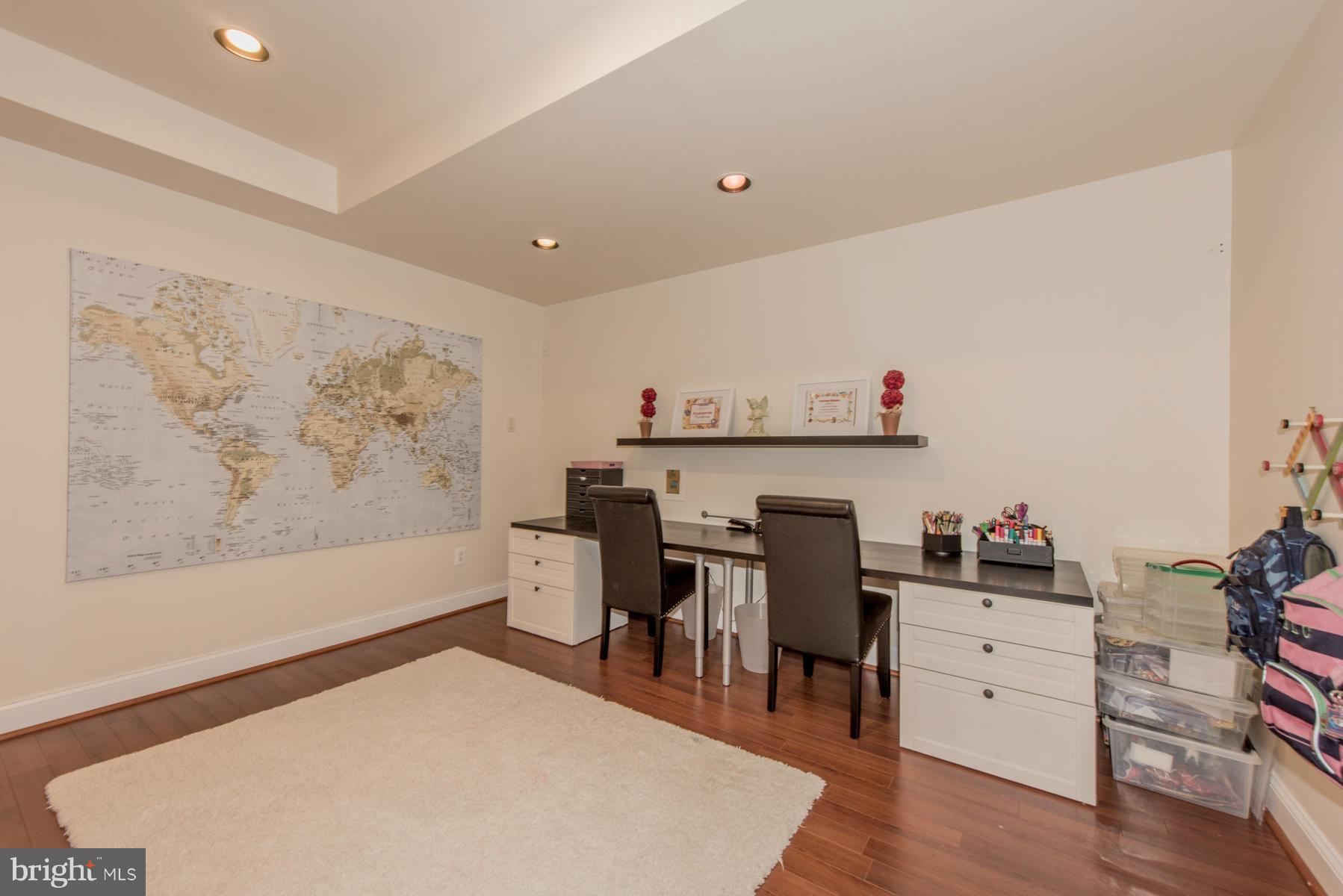 6013 Sandy Ridge Elkridge, MD 21075 - Photo 25 of 30 a workspace with furniture and wooden floor