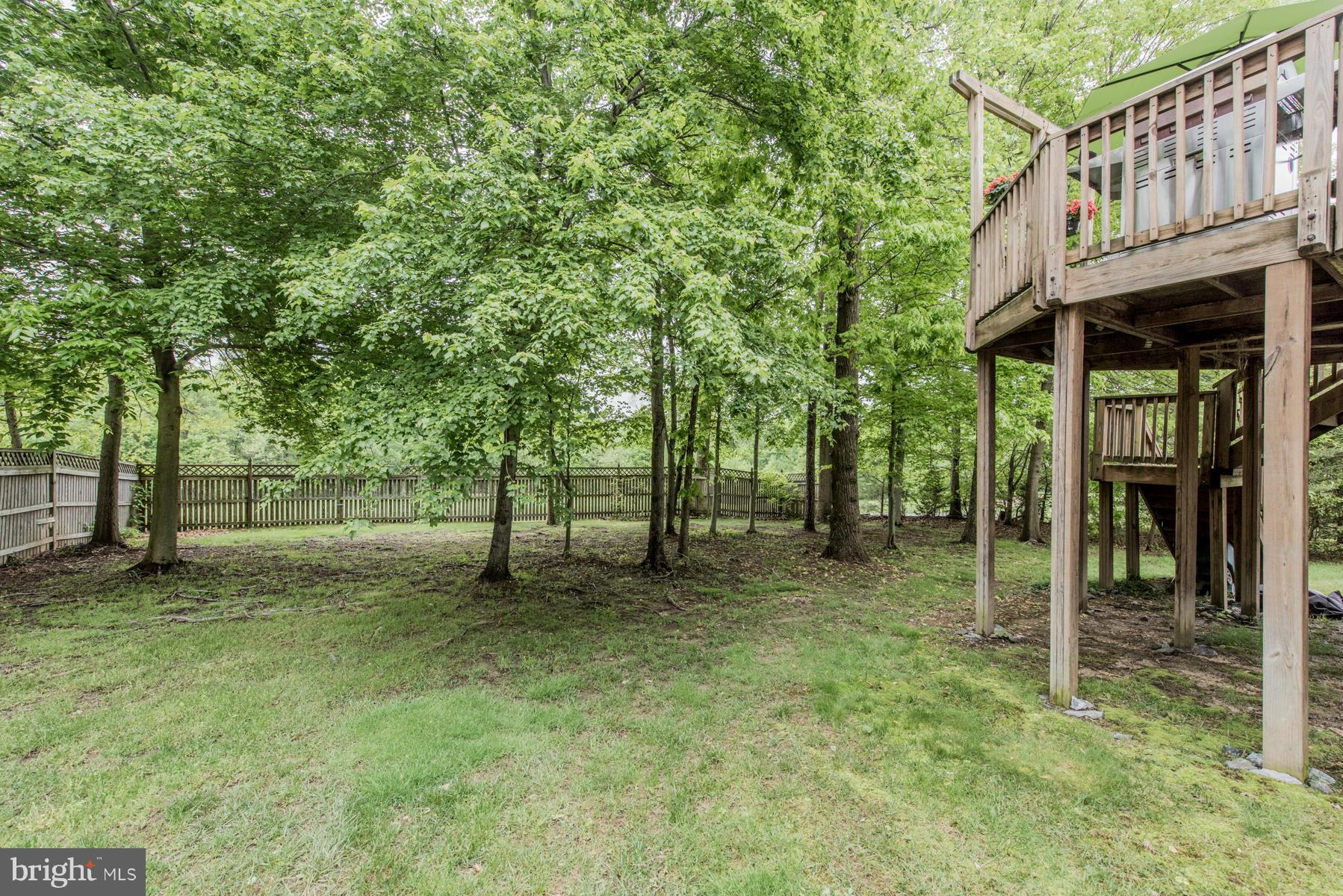 6013 Sandy Ridge Elkridge, MD 21075 - Photo 30 of 30 a backyard of a house with lots of green space