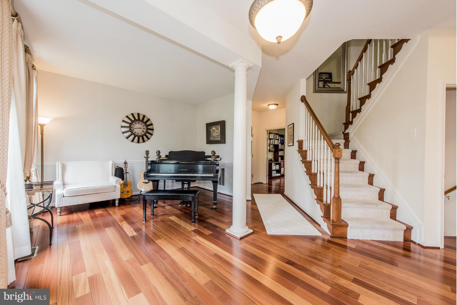 6013 Sandy Ridge Elkridge, MD 21075 - Photo 5 of 30 a living room with furniture and a wooden floor