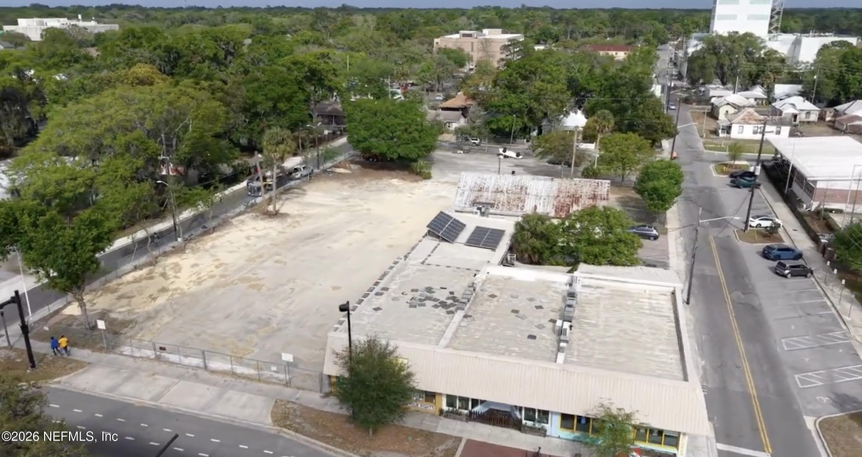 427 South Main Street Gainesville, FL 32601 - Photo 2 of 11 an aerial view of a house with a yard