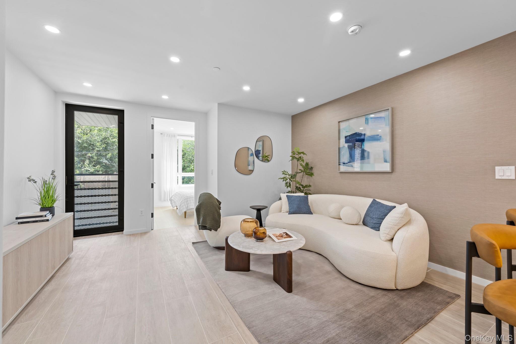 366 Harman Street, Unit 2R Brooklyn, NY 11237 - Photo 6 of 31 Living room with recessed lighting and light wood-style floors