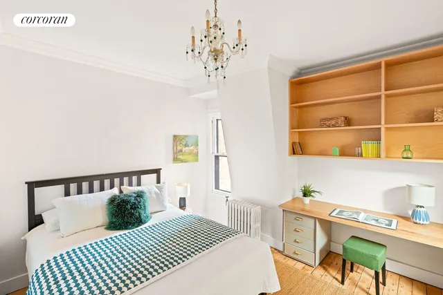 a bed room with a bed and a couch