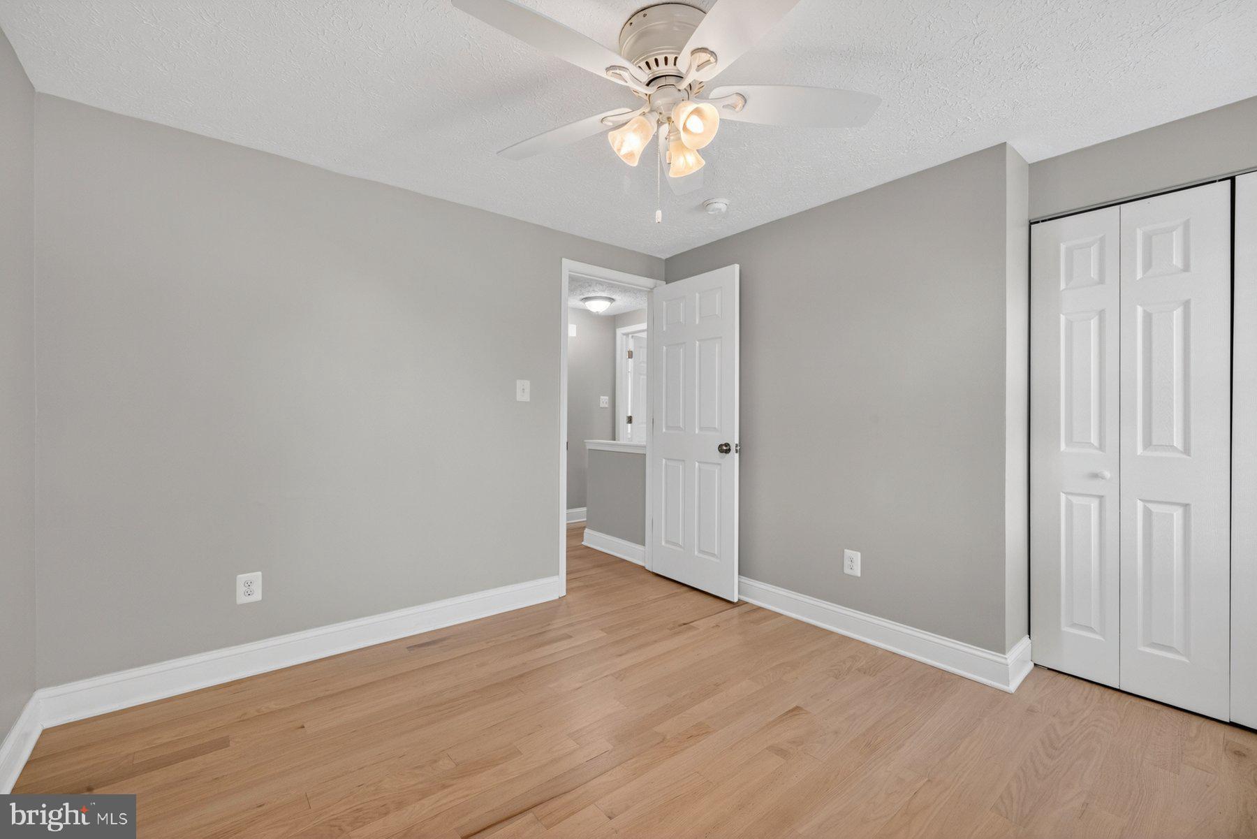 7518 Candytuft Court Springfield, VA 22153 - Photo 28 of 47 an empty room with fan and entrance