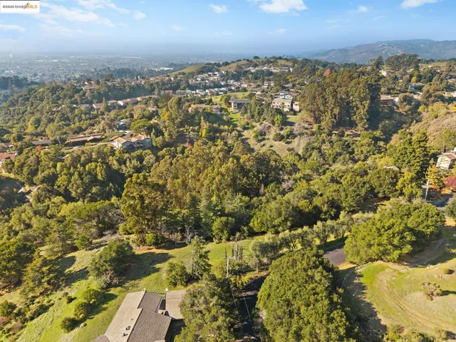 an aerial view of residential building with parking space