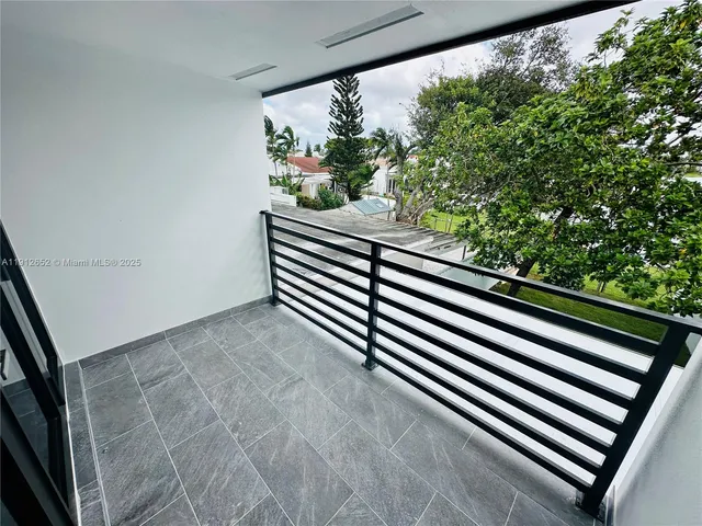 an empty room with windows and windows