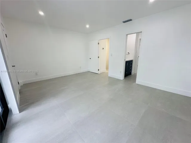 a view of a terrace with sitting area