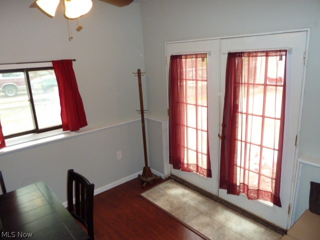 6364 Ridgeview Boulevard North Ridgeville, OH 44039 - Photo 11 of 14 Another view of dining room with laminated flooring, lighted ceiling paddle fan