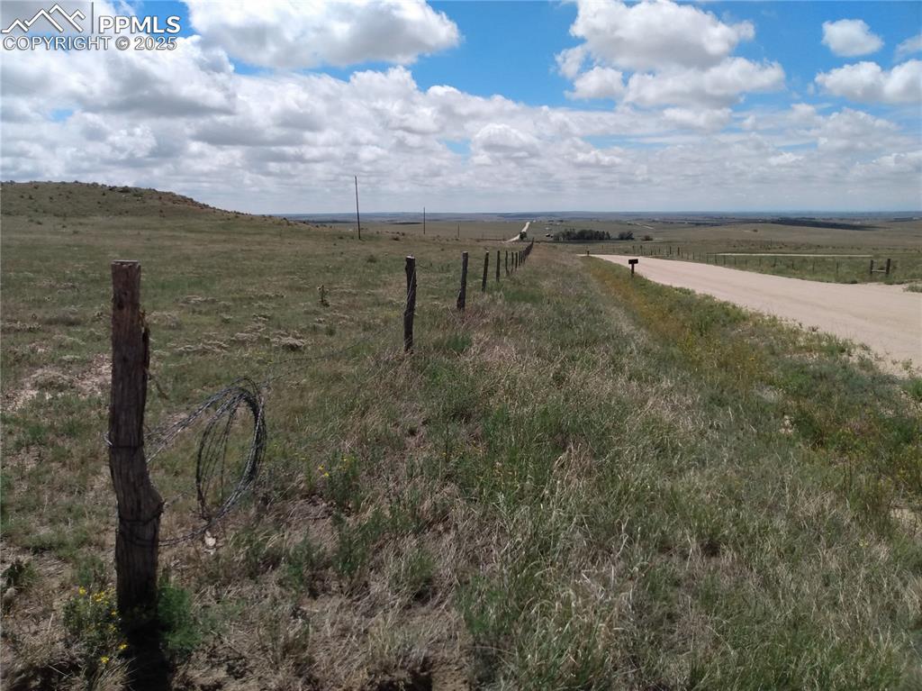 7575 South Calhan Road Calhan, CO 80808 - Photo 3 of 20 a view of a lake with a building in the background