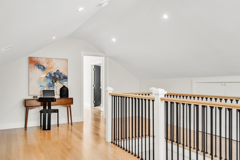 70 Birch Hill Road Belmont, MA 02478 - Photo 34 of 41 a workspace with furniture and wooden floor