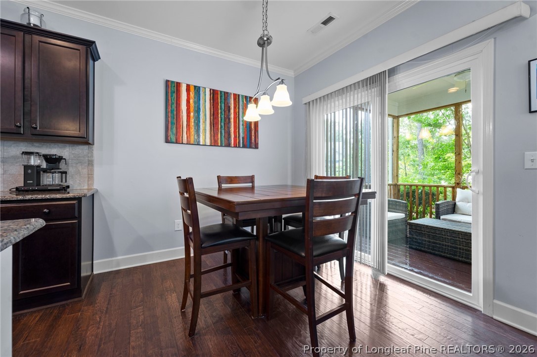 141 Pine Hawk Drive Spring Lake, NC 28390 - Photo 11 of 21 a dining room with furniture and window