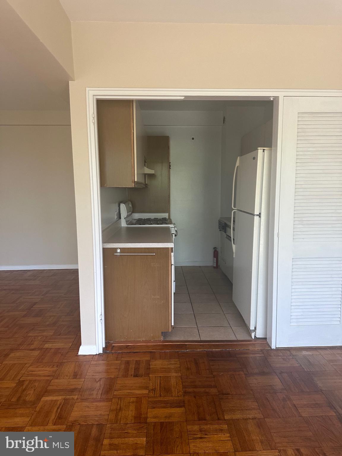 3601 Wisconsin Avenue Northwest, Unit 302 Washington, DC 20016 - Photo 9 of 9 a view of a kitchen with a sink