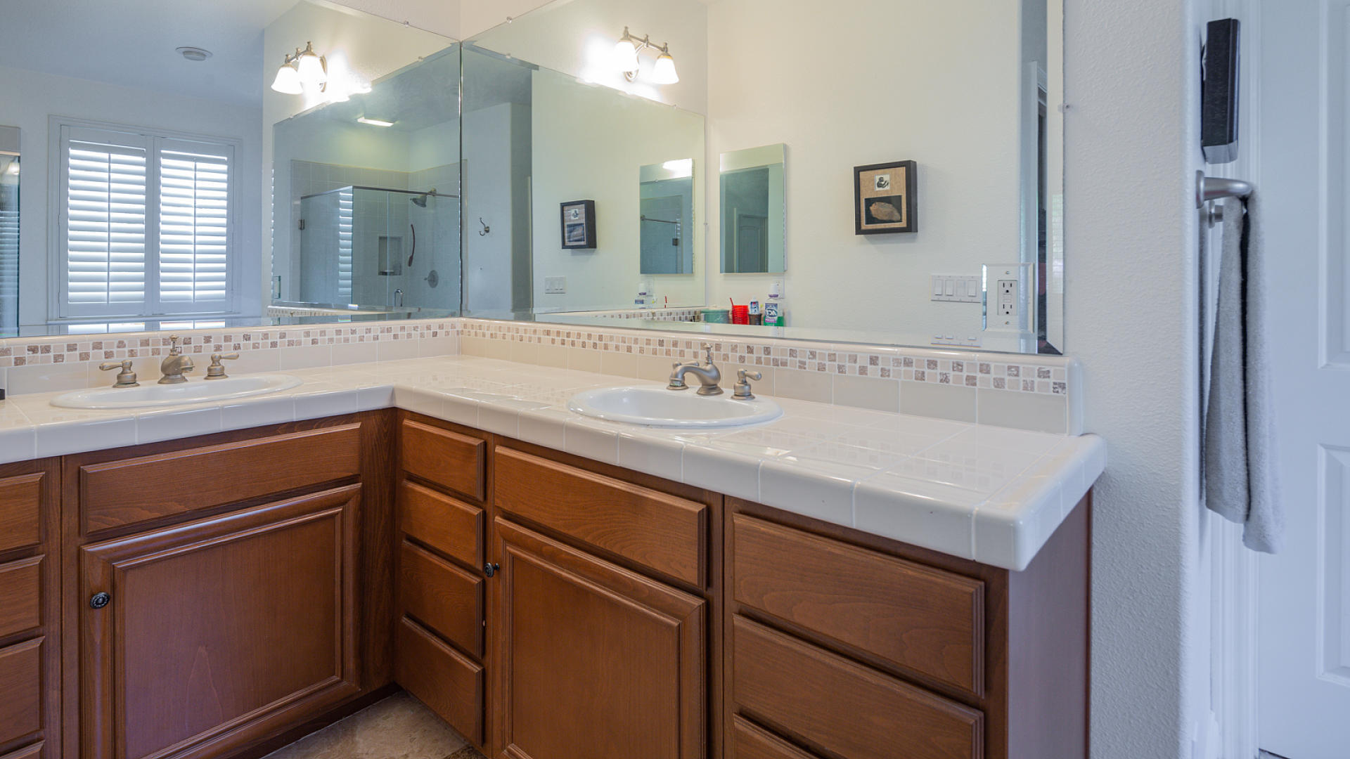 3709 Jupiter Avenue Lompoc, CA 93436 - Photo 11 of 27 a bathroom with a sink and a mirror