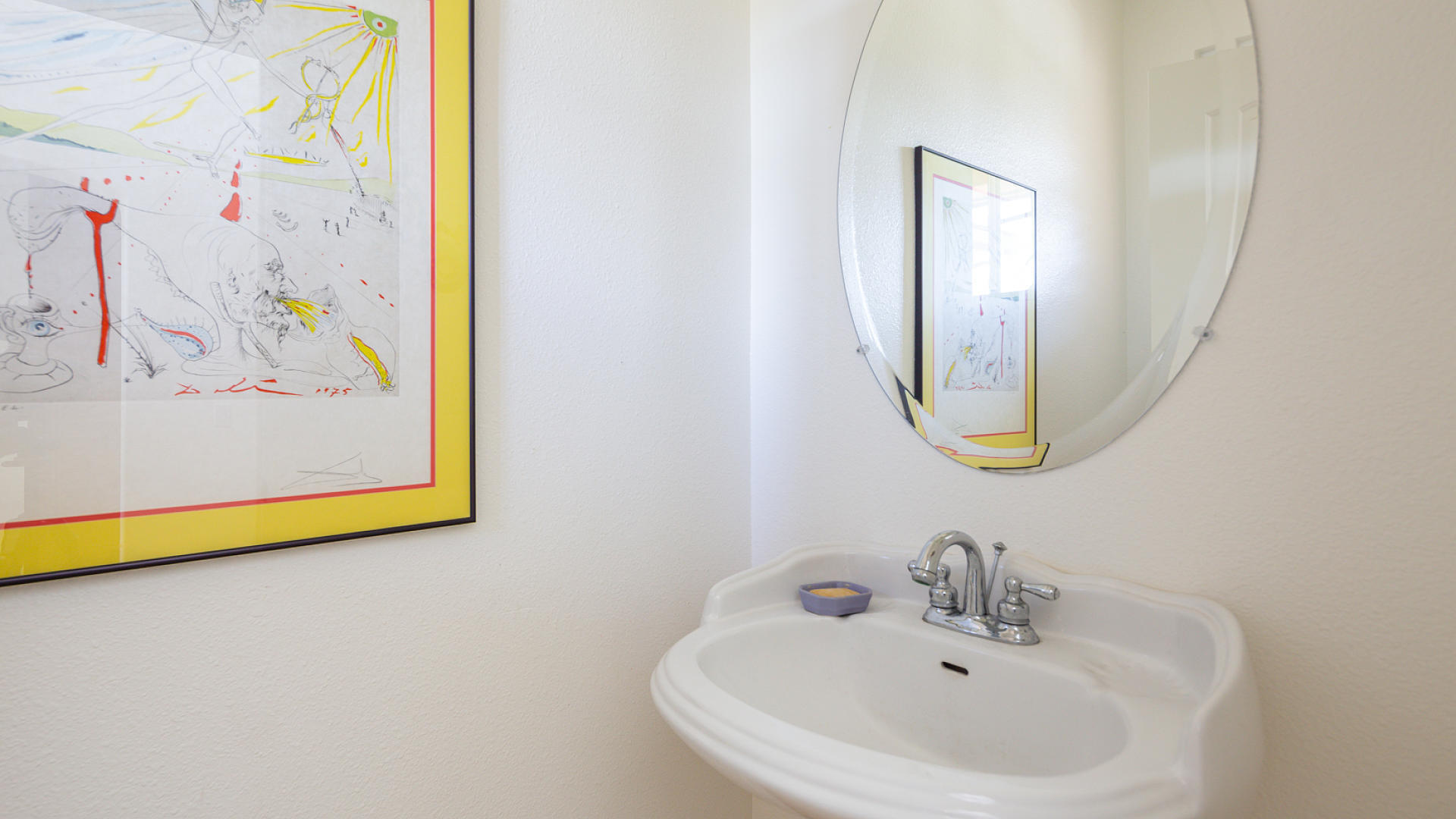 3709 Jupiter Avenue Lompoc, CA 93436 - Photo 19 of 27 a bathroom with a sink and a mirror