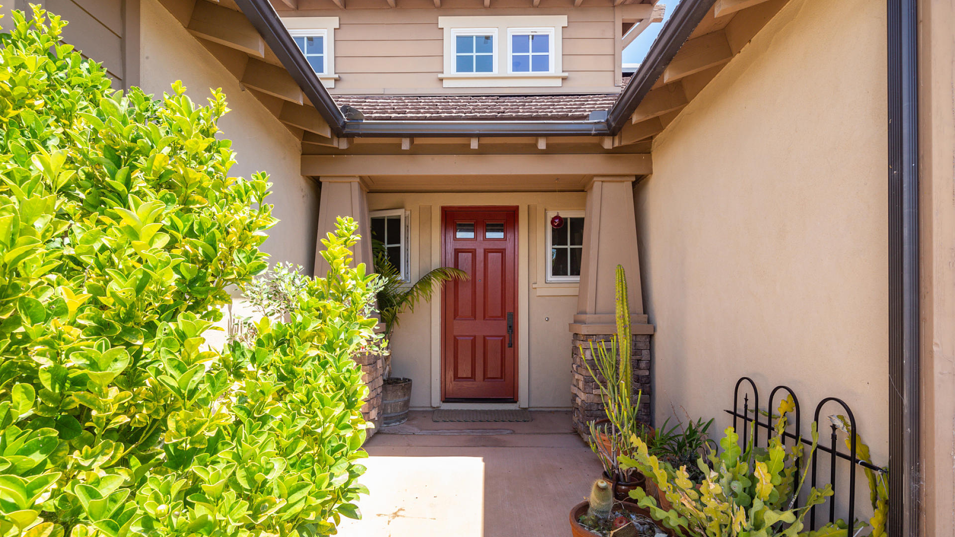 3709 Jupiter Avenue Lompoc, CA 93436 - Photo 2 of 27 a front view of a house with a plant
