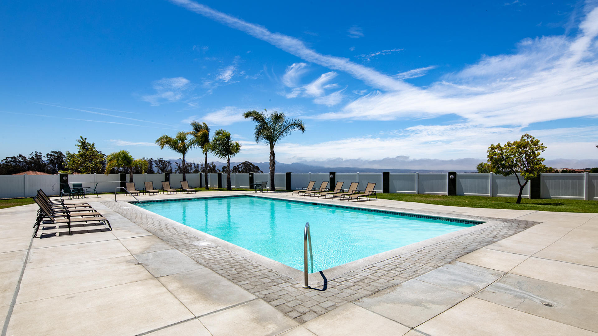 3709 Jupiter Avenue Lompoc, CA 93436 - Photo 21 of 27 a view of a swimming pool with a lounge chair