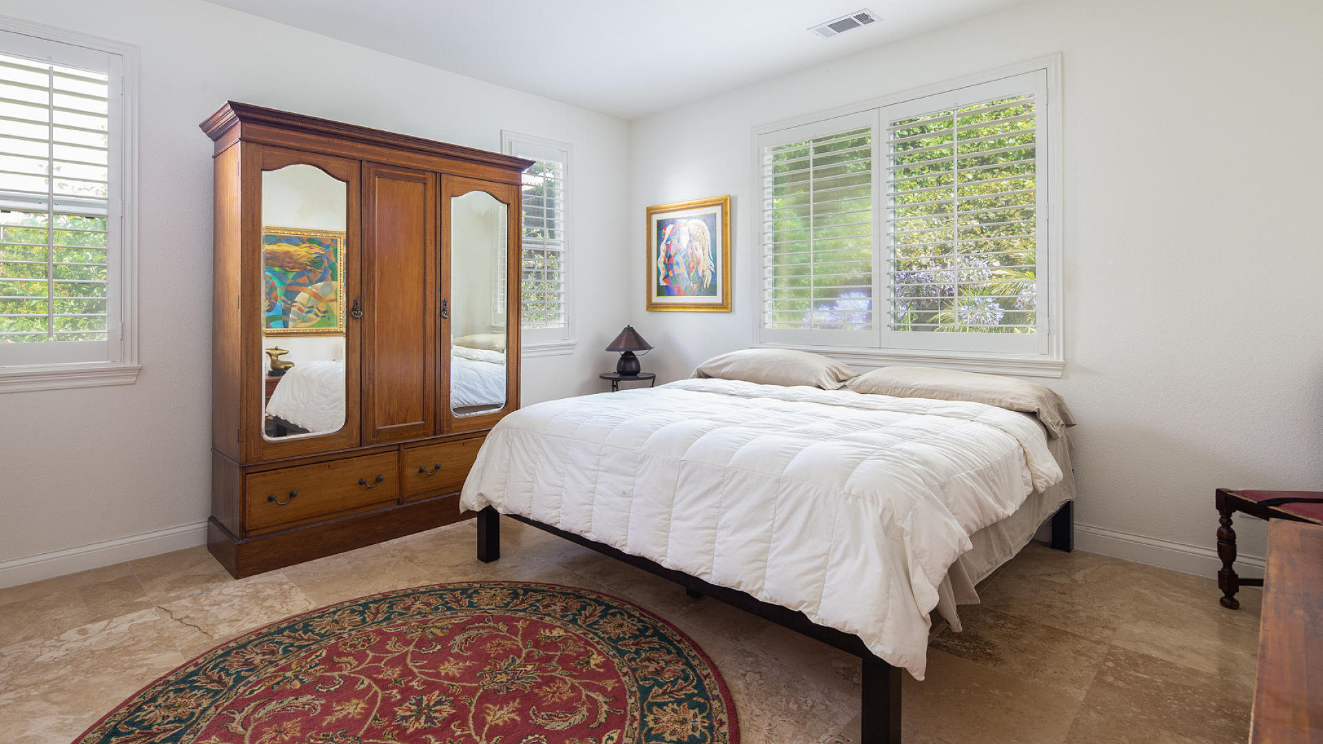 3709 Jupiter Avenue Lompoc, CA 93436 - Photo 10 of 27 a bed sitting in a bedroom next to a window