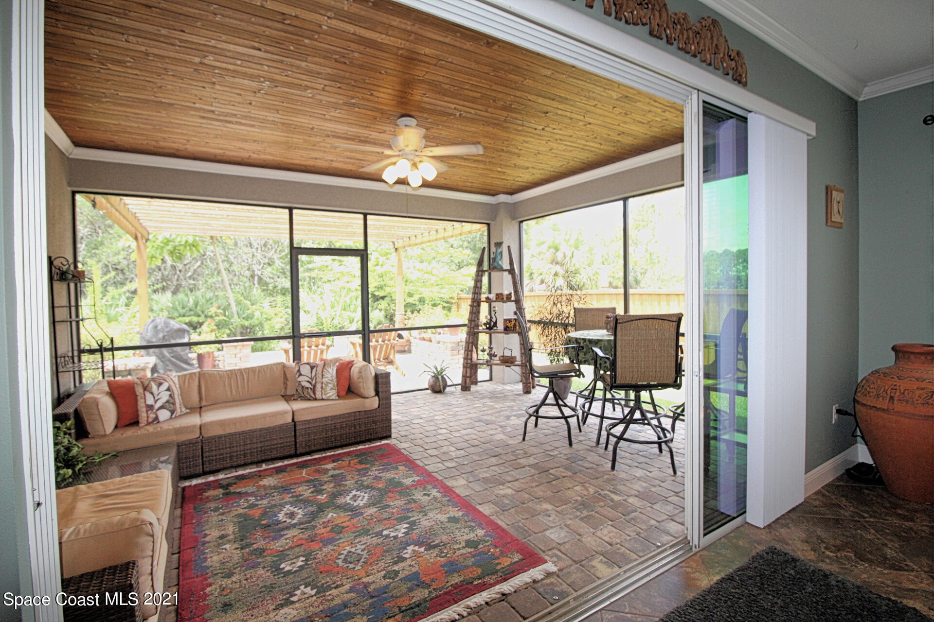 4034 Preservation Circle Melbourne, FL 32934 - Photo 8 of 25 a living room with furniture and a large window