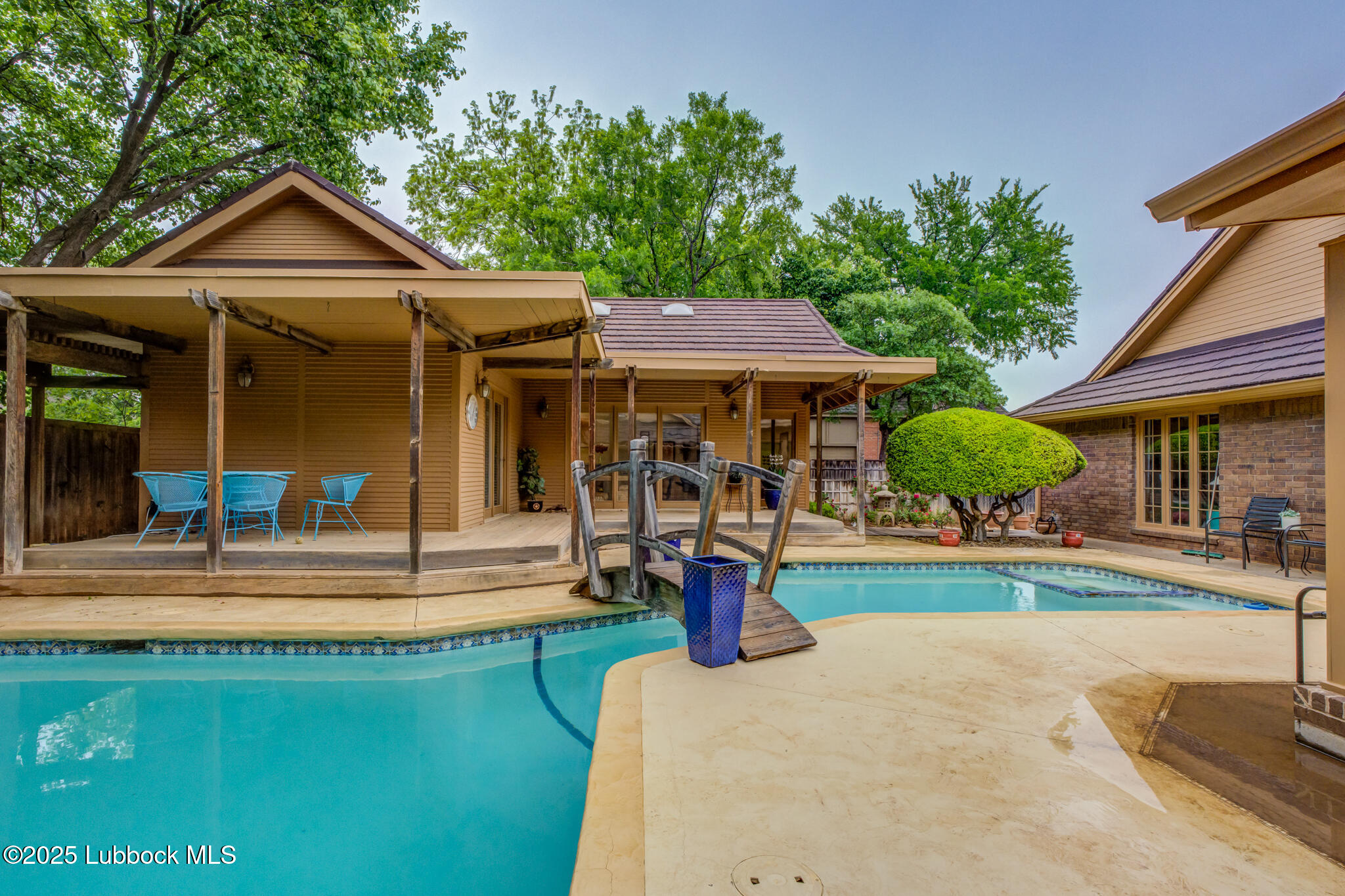 4206 89th Street Lubbock, TX 79423 - Photo 45 of 50 a front view of a house with porch