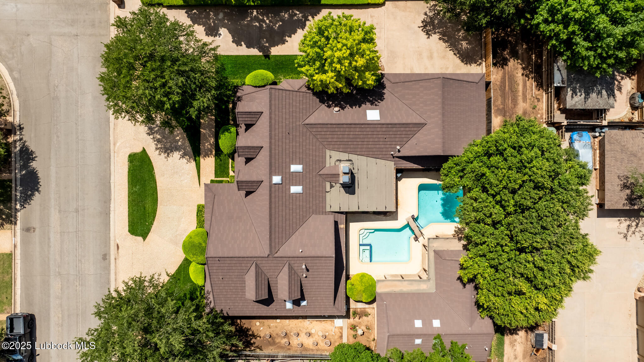 4206 89th Street Lubbock, TX 79423 - Photo 49 of 50 an aerial view of a house with a garden