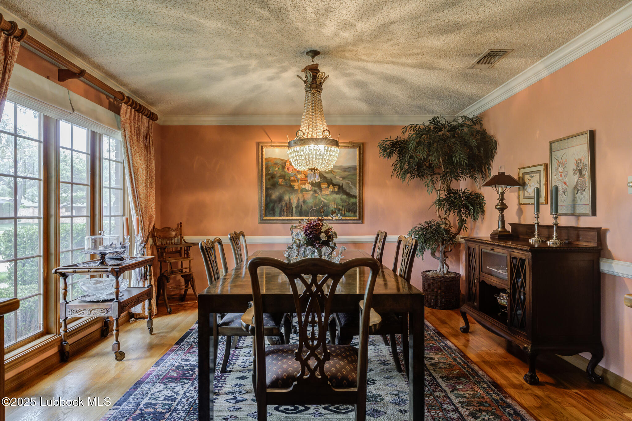 4206 89th Street Lubbock, TX 79423 - Photo 8 of 50 a view of a dining room with furniture window and outside view