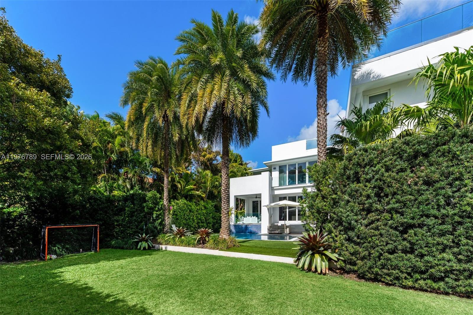 741 Harbor Drive Key Biscayne, FL 33149 - Photo 21 of 36 a view of a house with a yard