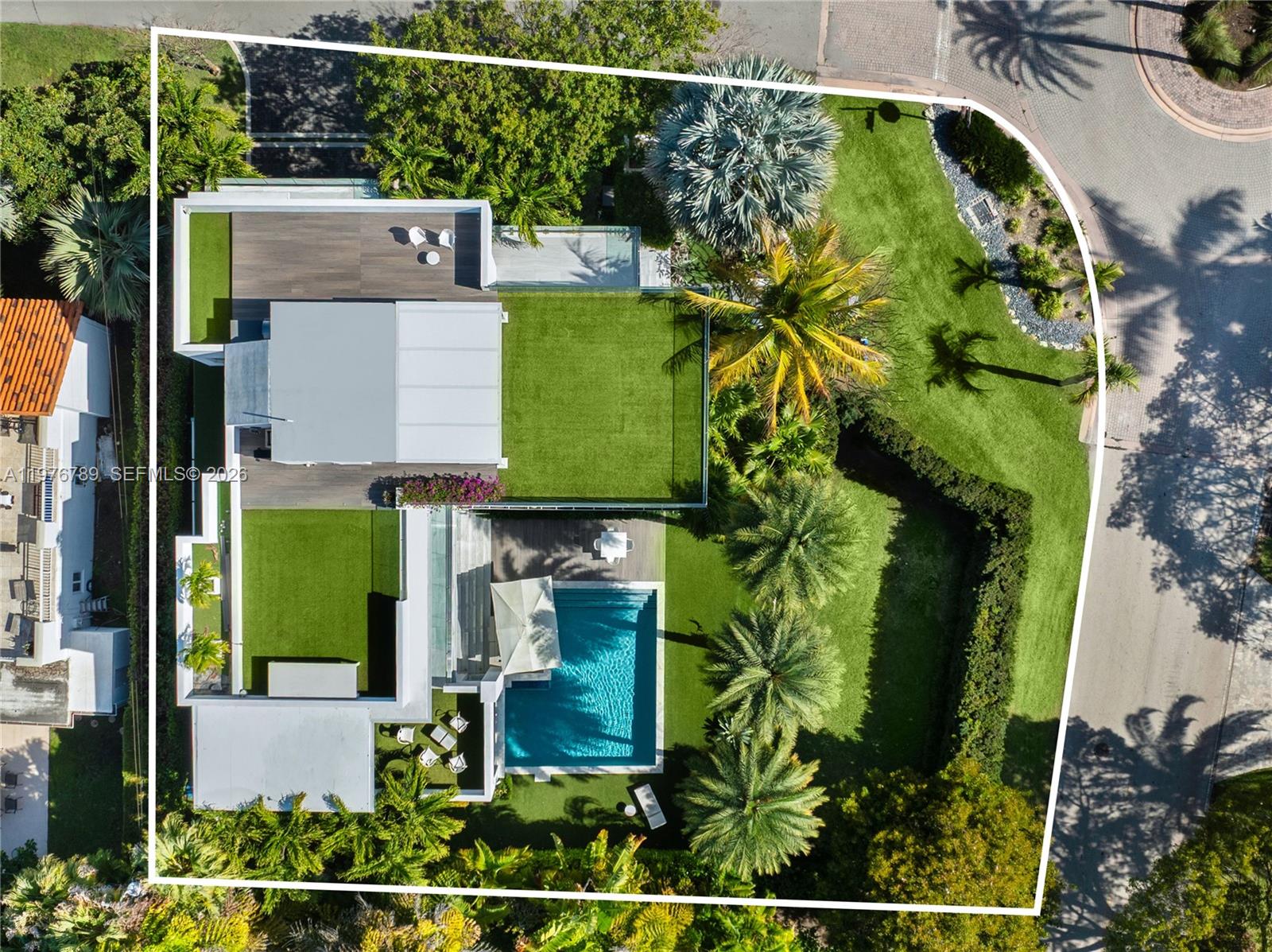 741 Harbor Drive Key Biscayne, FL 33149 - Photo 22 of 36 an aerial view of a house with a garden