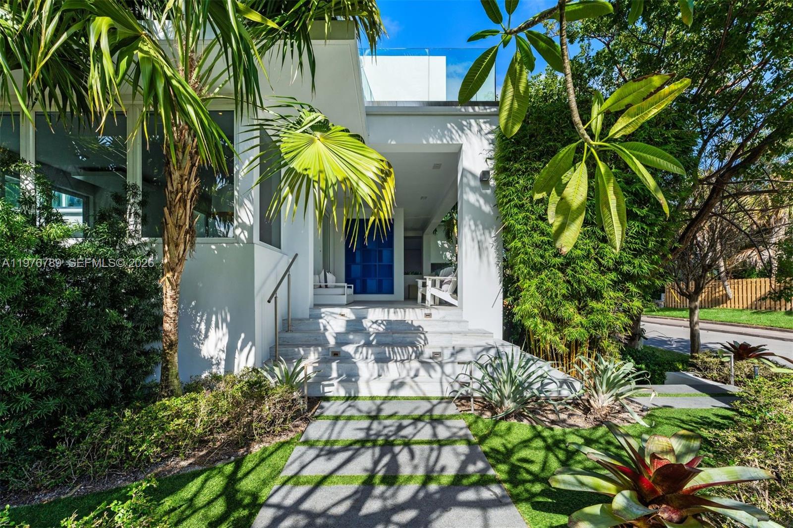741 Harbor Drive Key Biscayne, FL 33149 - Photo 24 of 36 a view of a house with a tree
