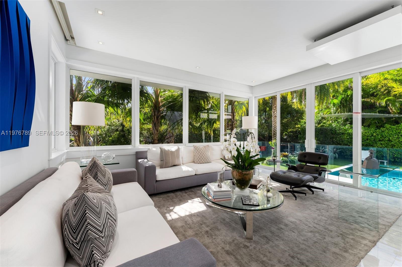 741 Harbor Drive Key Biscayne, FL 33149 - Photo 4 of 36 a living room with furniture and a large window