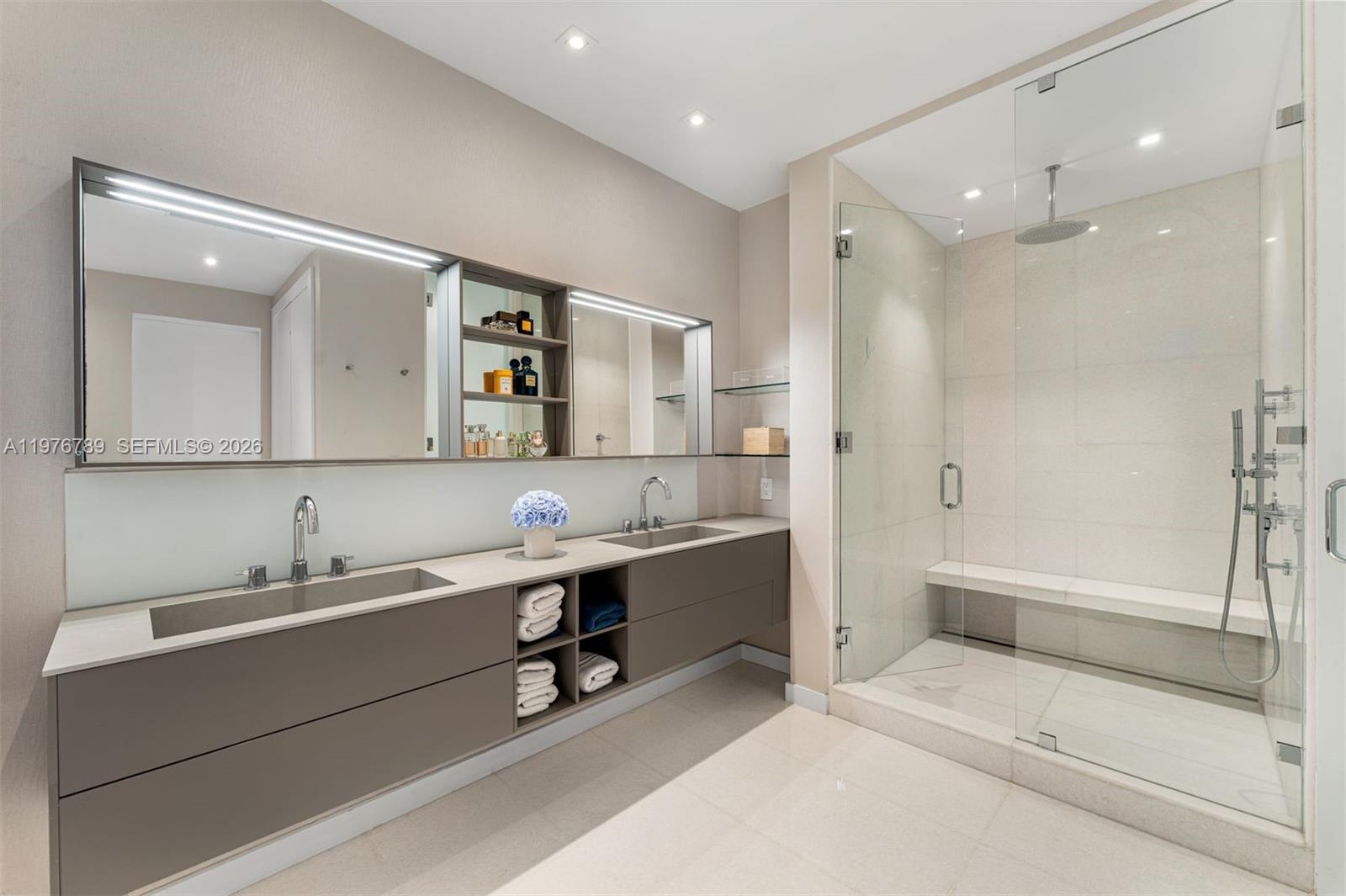 741 Harbor Drive Key Biscayne, FL 33149 - Photo 10 of 36 a bathroom with a sink a toilet and shower