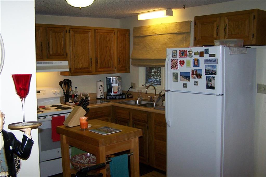 74 Cobb Road Camden, ME 04843 - Photo 4 of 15 Galley kitchen... also an area for a...