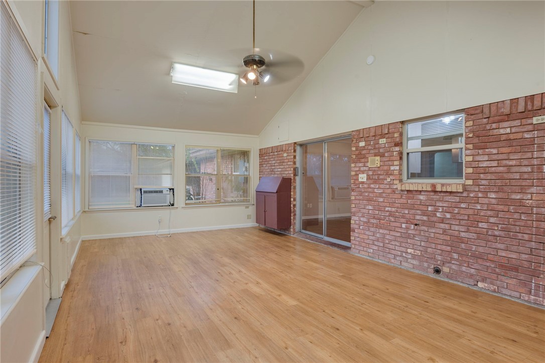 2606 Melba Circle Bryan, TX 77802 - Photo 13 of 34 a view of empty room with wooden floor