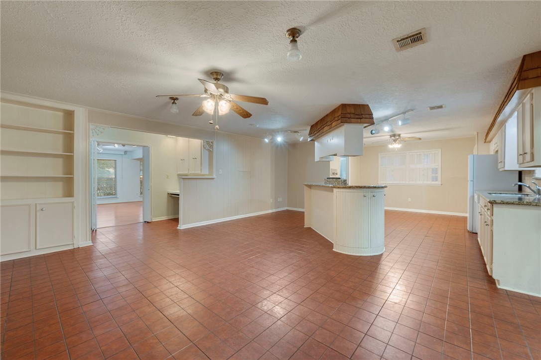 2606 Melba Circle Bryan, TX 77802 - Photo 21 of 34 a view of a kitchen with furniture and wooden floor