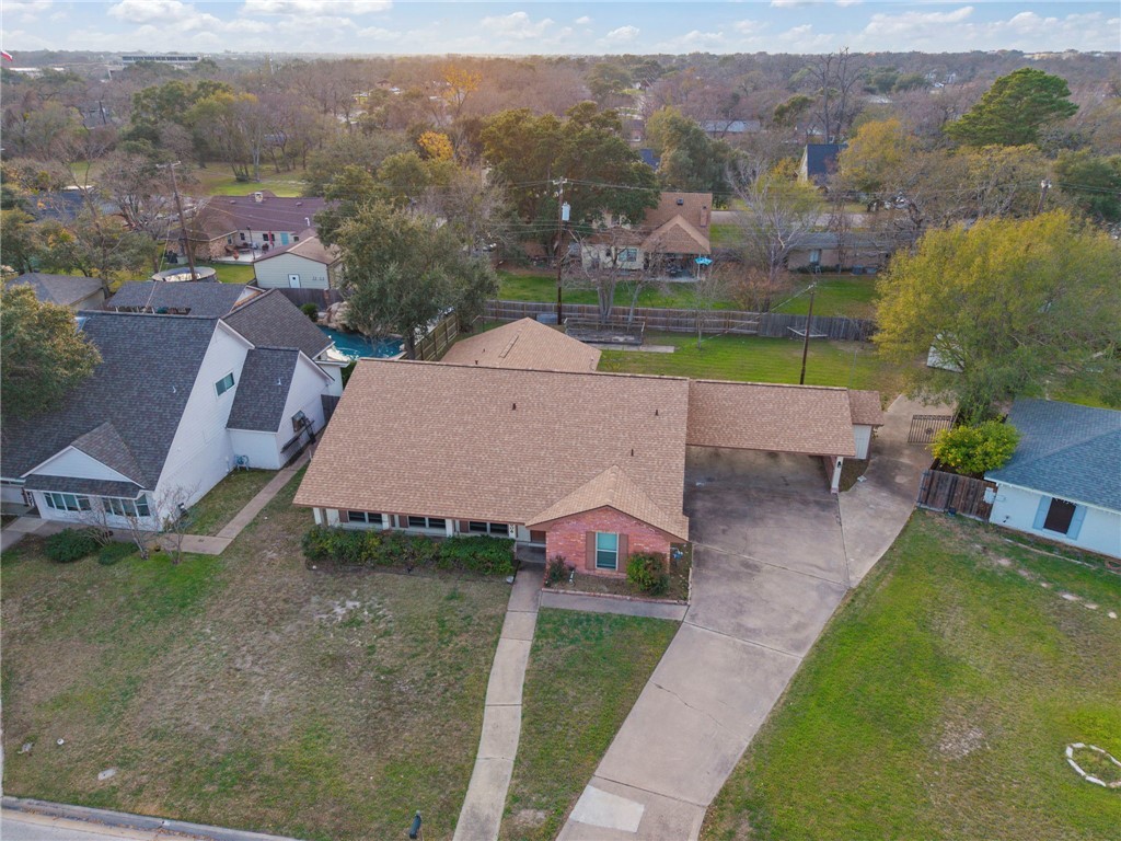 2606 Melba Circle Bryan, TX 77802 - Photo 4 of 34 an aerial view of a house with a yard pool outdoor seating and yard