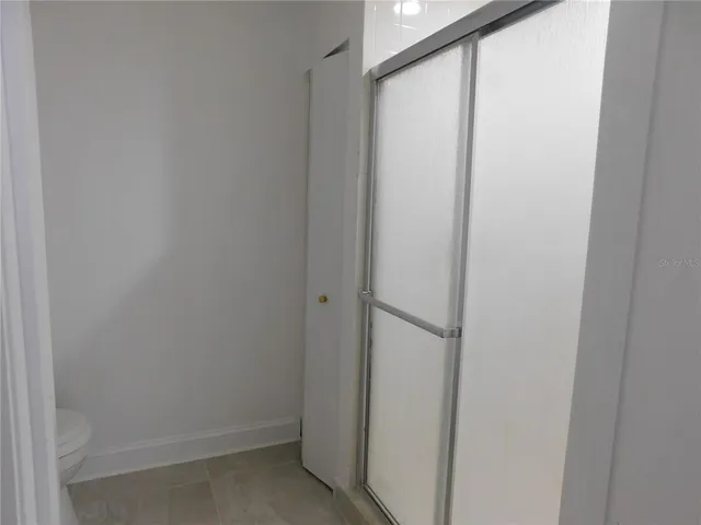 a view of an empty walk in closet