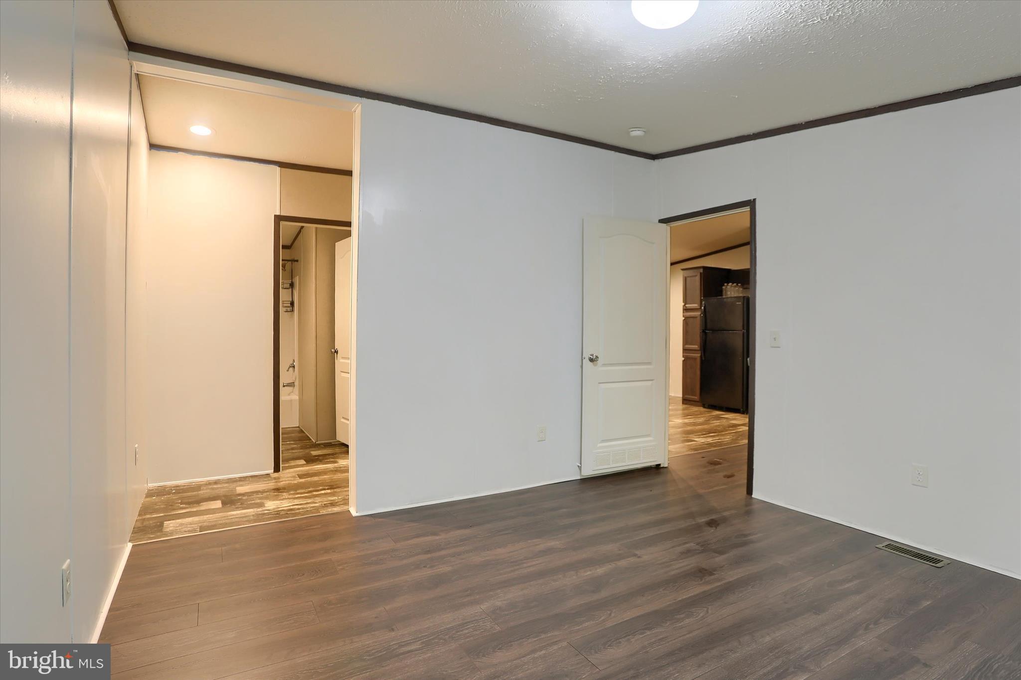1148 Moulstown Road North Hanover, PA 17331 - Photo 12 of 29 a view of an empty room with wooden floor and a window