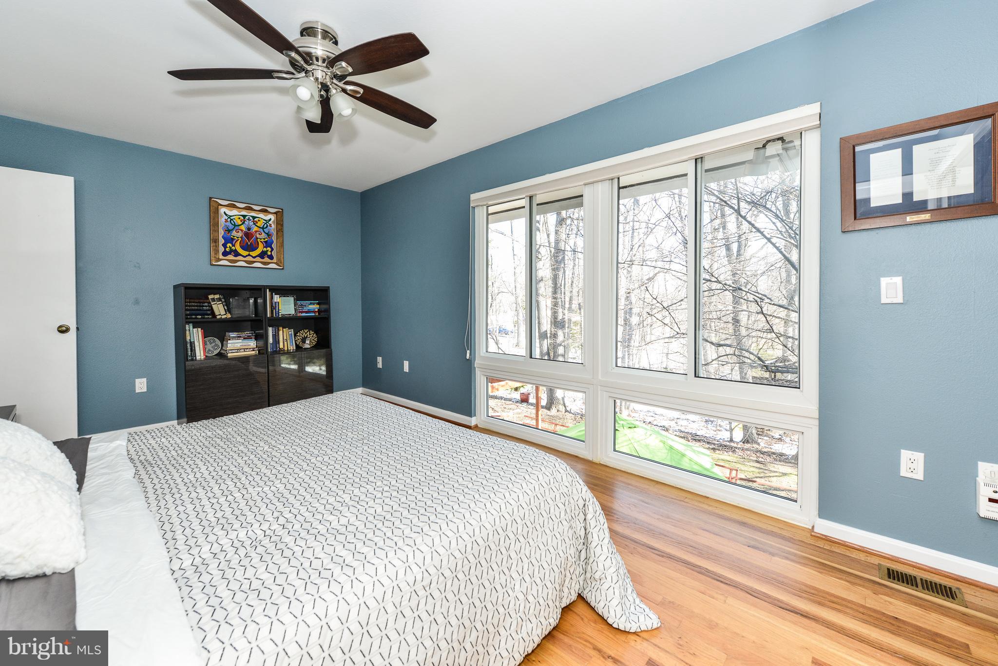 1741 Wainwright Drive Reston, VA 20190 - Photo 17 of 29 Wall of windows, beautiful view and custom shades!