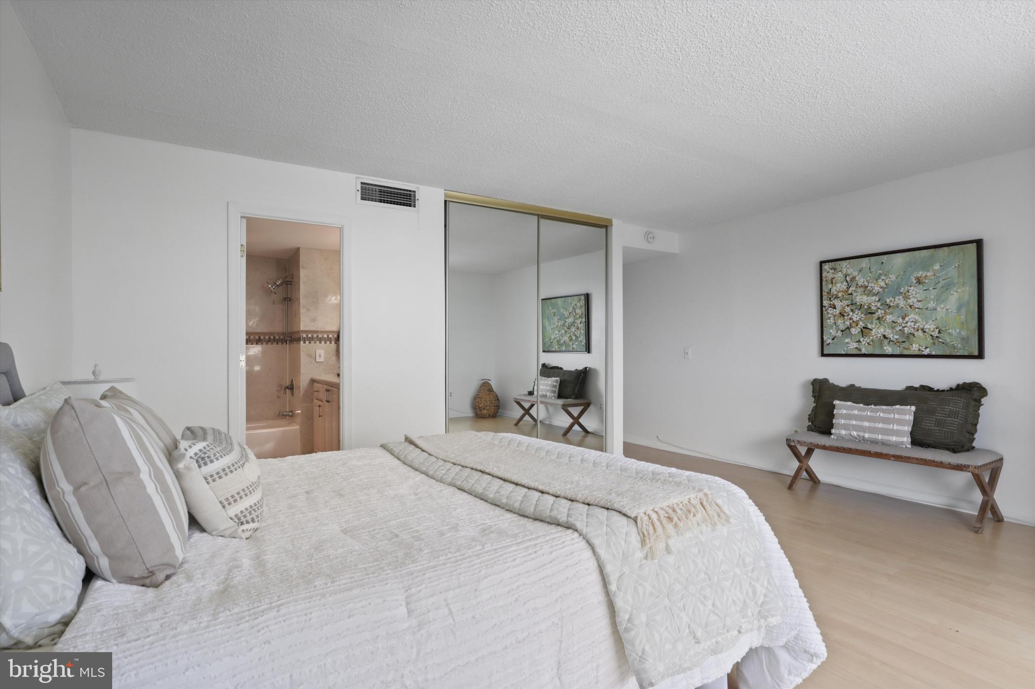 6101 Edsall Road, Unit 611 Alexandria, VA 22304 - Photo 26 of 39 a bedroom with a bed and a couch