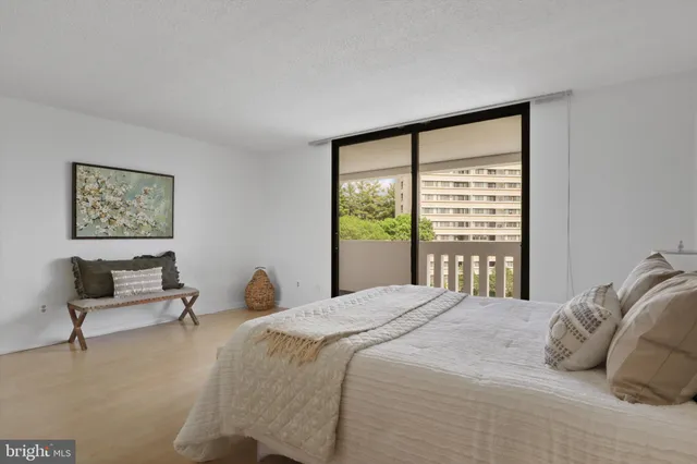 a bathroom with a sink a mirror a bathtub and shower
