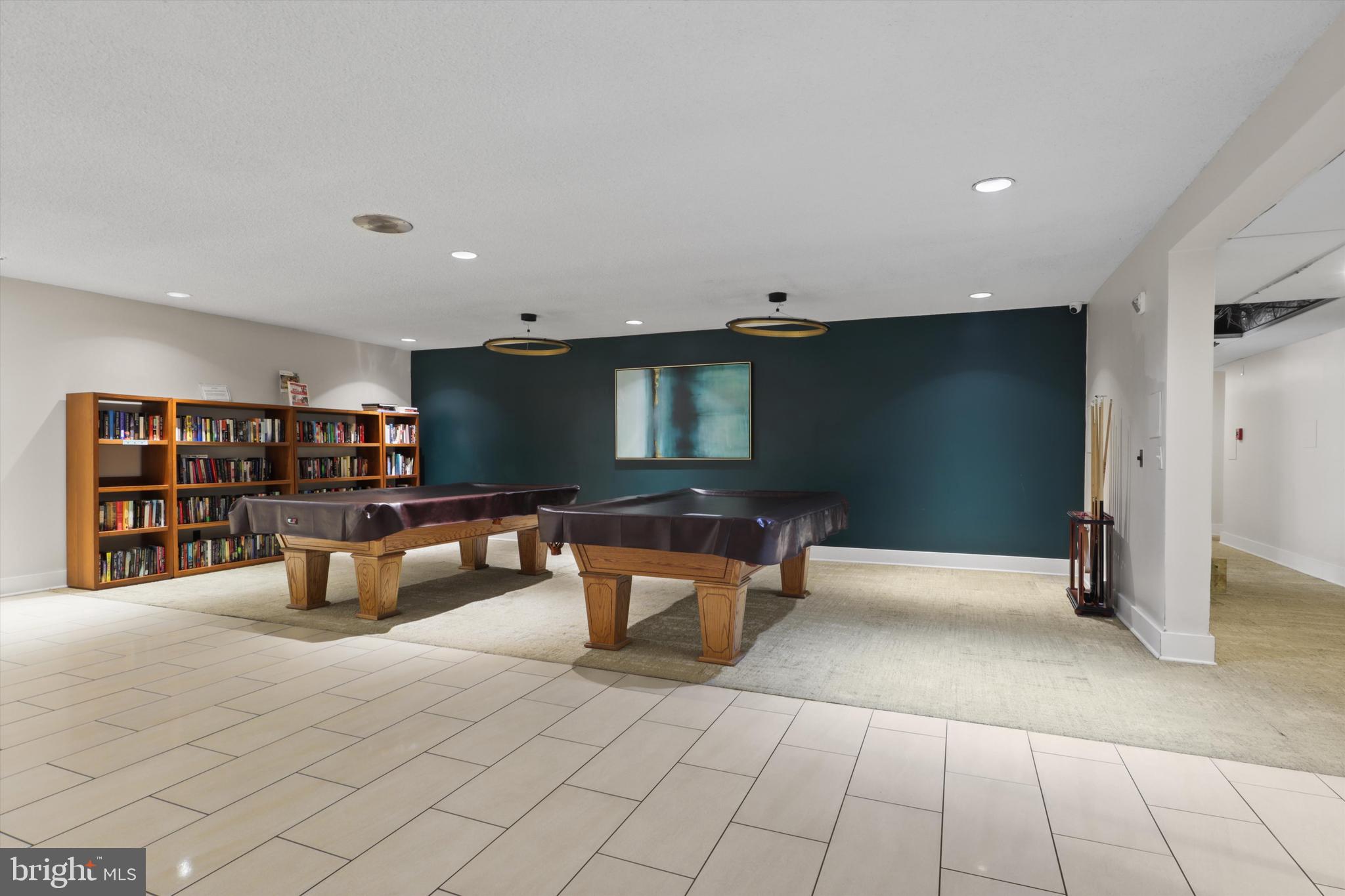 6101 Edsall Road, Unit 611 Alexandria, VA 22304 - Photo 36 of 39 a kitchen view with a counter space a sink a refrigerator and chandelier