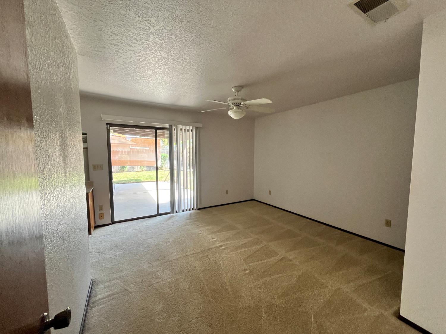 312 Roxanne Drive Patterson, CA 95363 - Photo 22 of 28 a view of an empty room and window